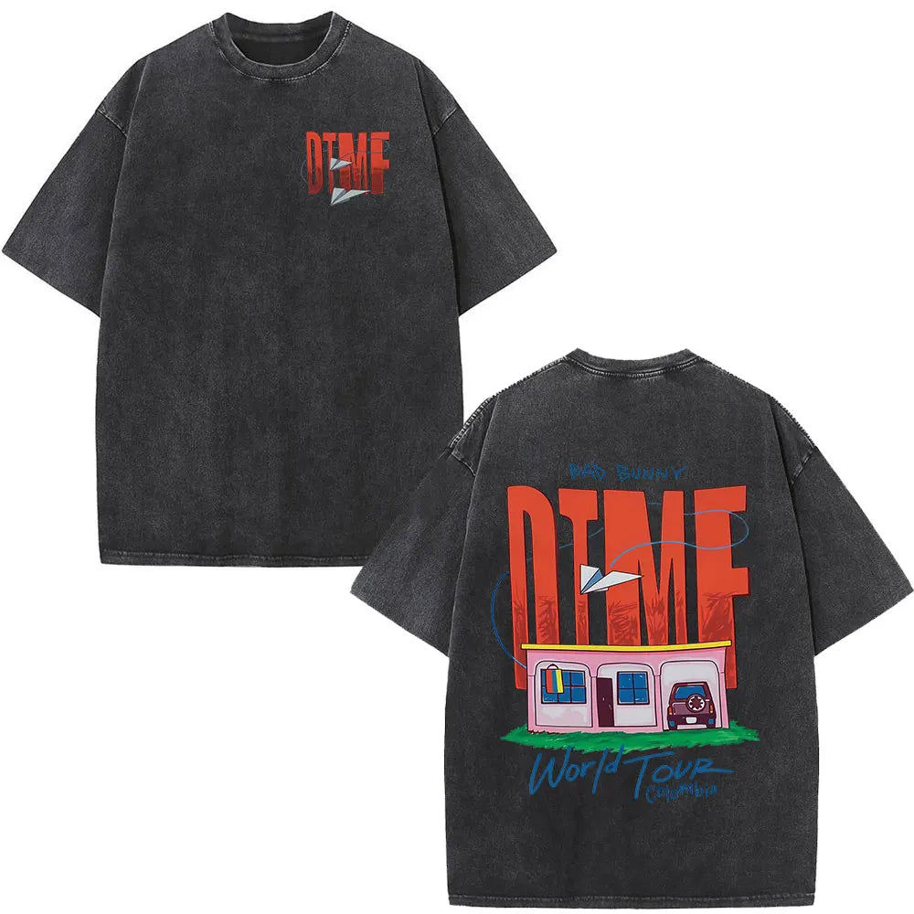 Black oversized t-shirt with faded fabric and bold red dtmf lettering featuring a colorful pink building graphic for dtmf world tour and rapper bad bunny debi tirar mas fashion