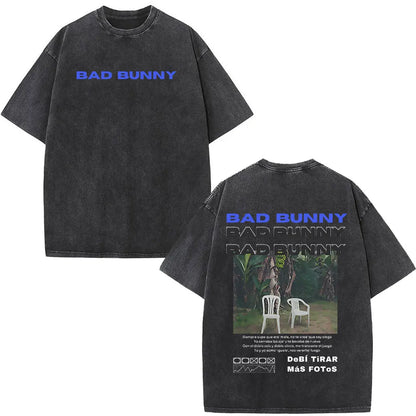 Black oversized rapper bad bunny t-shirt with faded blue text and white chairs graphic on back dtmf world tour design