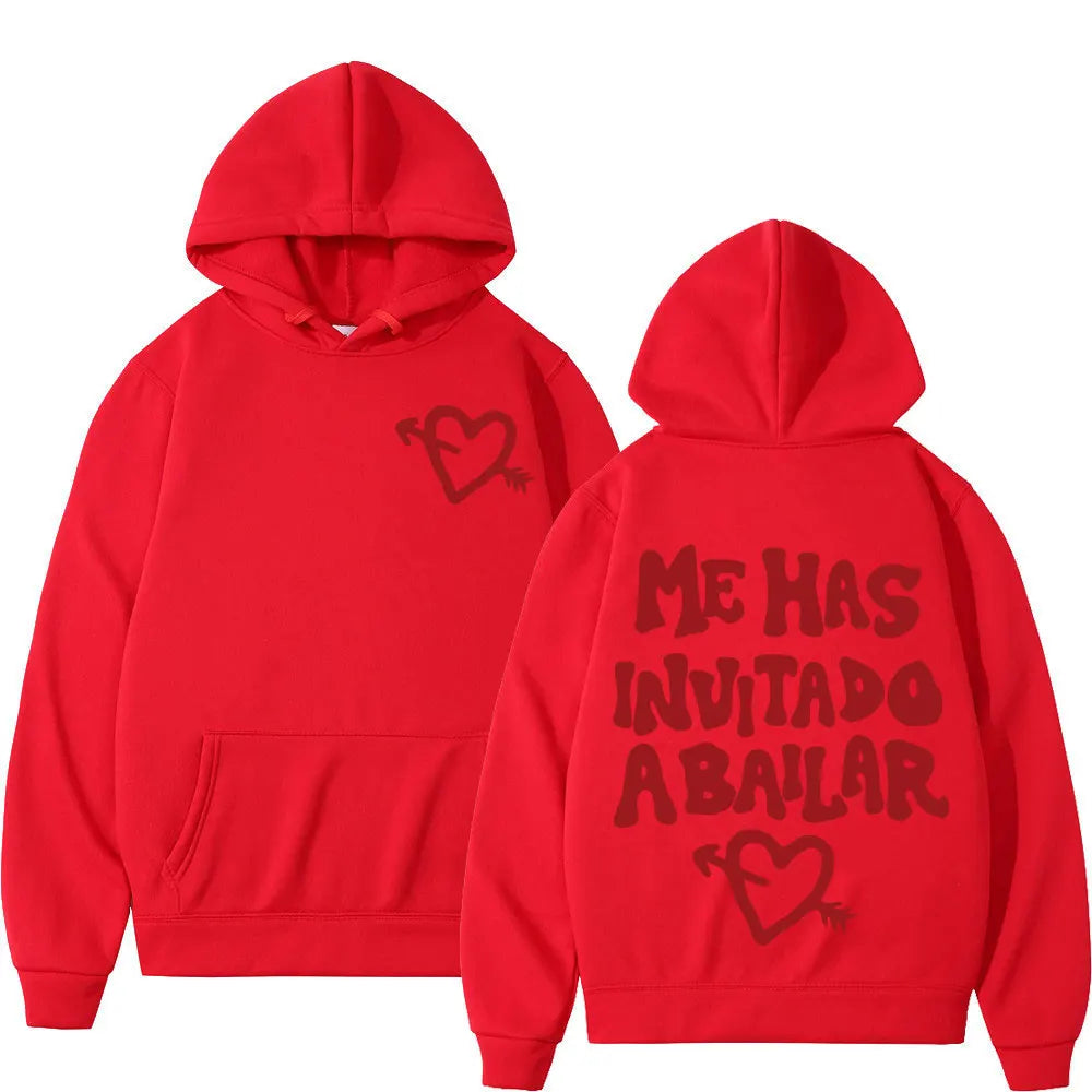 Red hoodie featuring heart and arrow graphic front and bold me has invitado a bailar text on back rapper dani fernandez punk sportswear autumn
