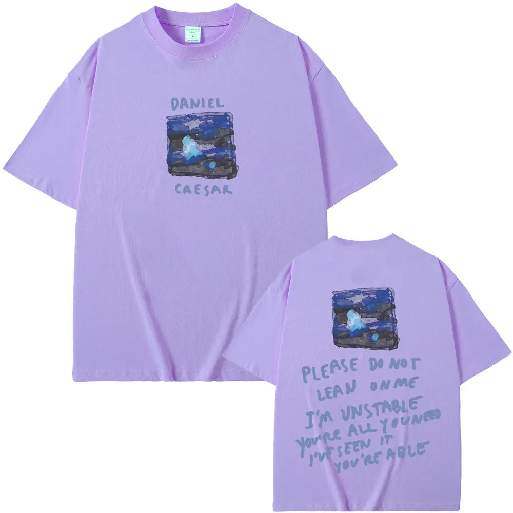 Lavender short-sleeved t-shirt with rapper daniel caesar graphic and abstract blue design for women hip hop fashion