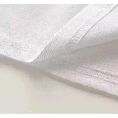 White cotton rapper delaossa la madruga t shirt with neat double stitched edges for hip hop streetwear fans
