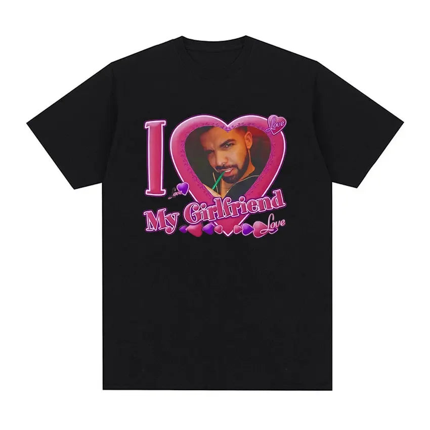 Black unisex t-shirt featuring pink heart graphic with drake portrait and i love my girlfriend text from certified lover boy album hip hop fashion