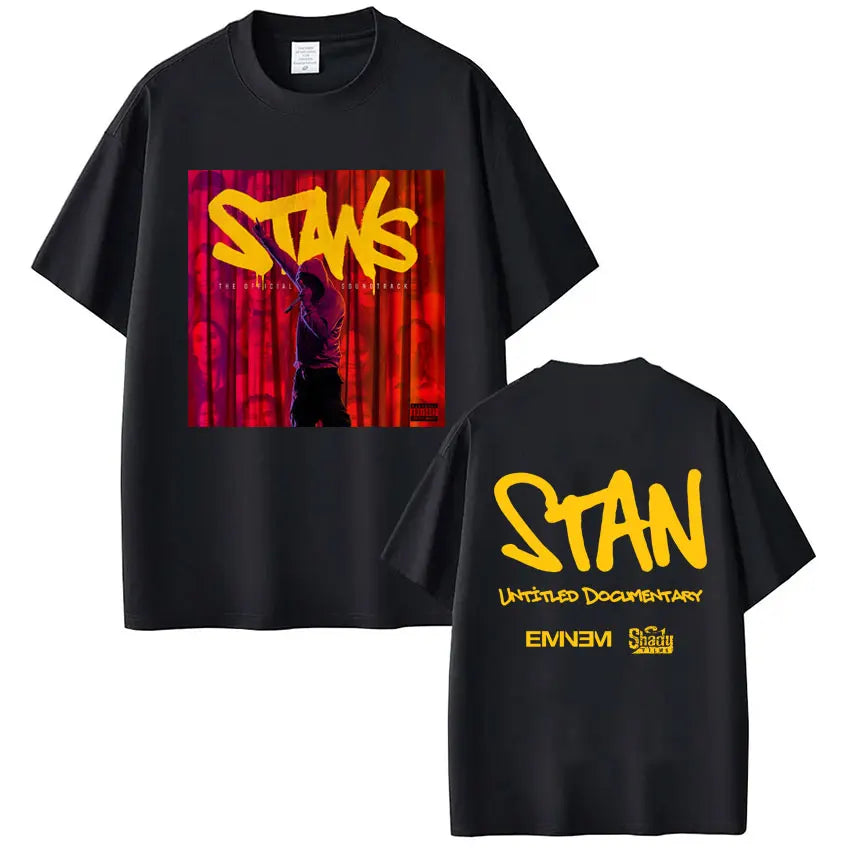 Black short-sleeved cotton t-shirt showing the back with bold yellow stan album stans print for rapper eminem hip hop vintage style