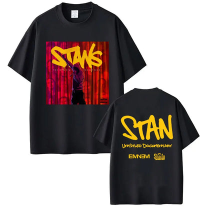 Black short-sleeved cotton t-shirt showing the back with bold yellow stan album stans print for rapper eminem hip hop vintage style