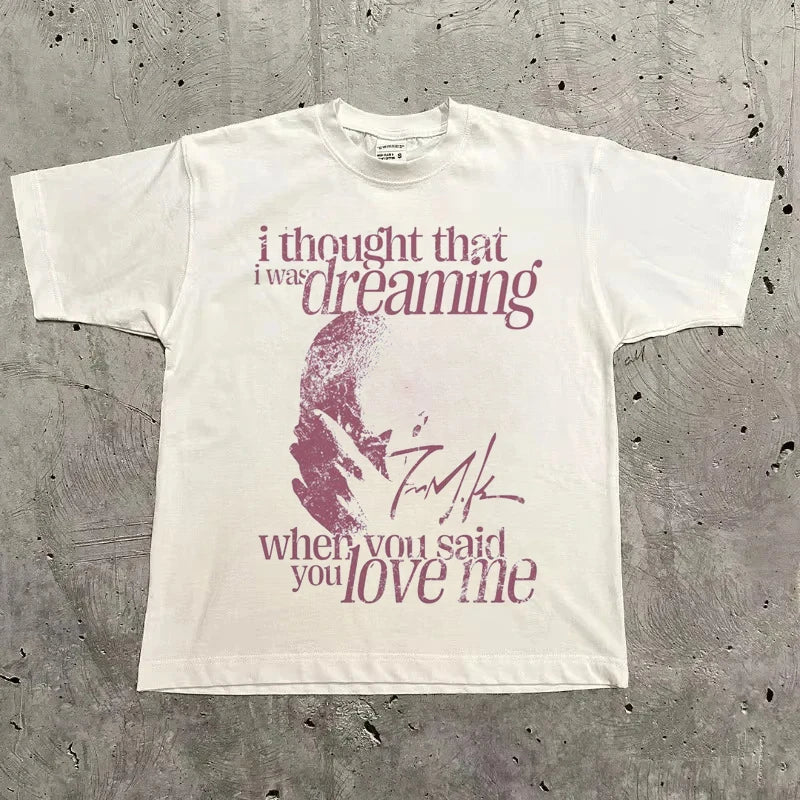White cotton rapper frank retro t shirt with distressed pink hip hop ocean graphic and blond fashion oversized fit