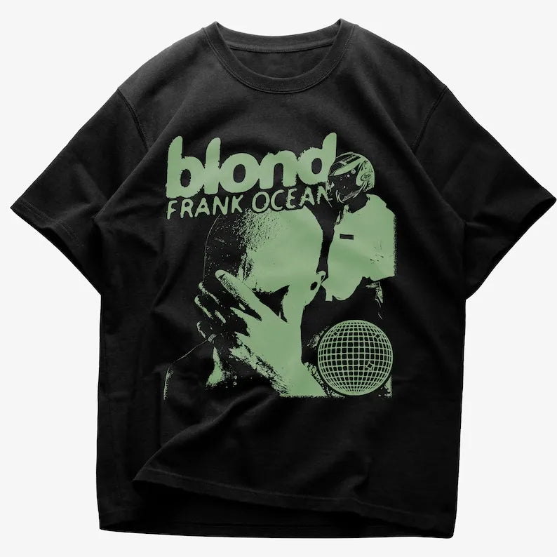 Black cotton short-sleeved t-shirt featuring a glowing green rapper frank retro graphic and y2k unisex blond text