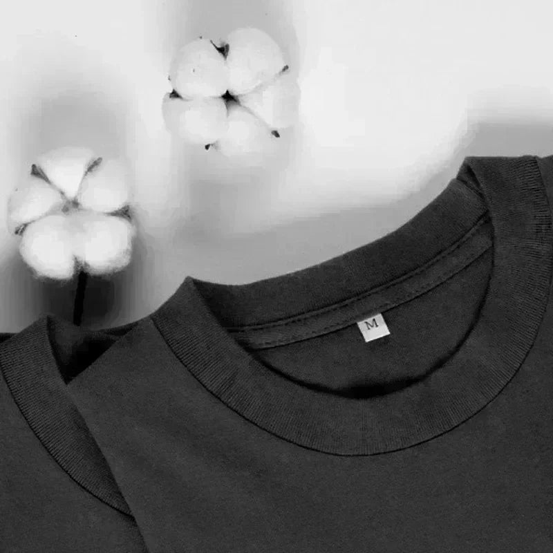 Dark gray cotton rapper frank retro graphic t shirt with ribbed crew neck and m size tag for hip hop fashion