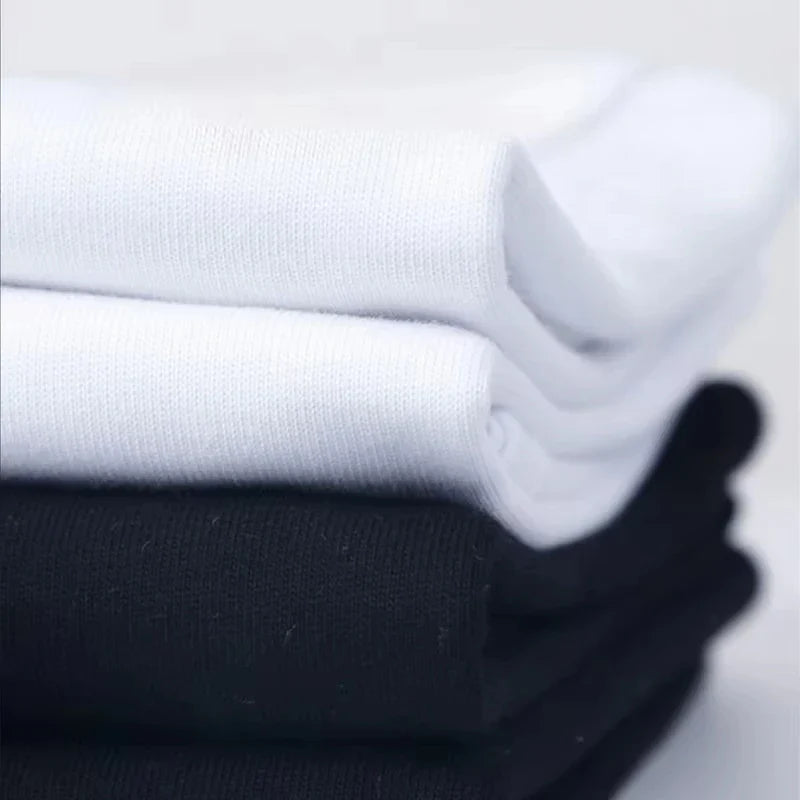 Stacked white and black ribbed crew socks paired with rapper frank retro graphic t shirt cotton cotton unisex clothing