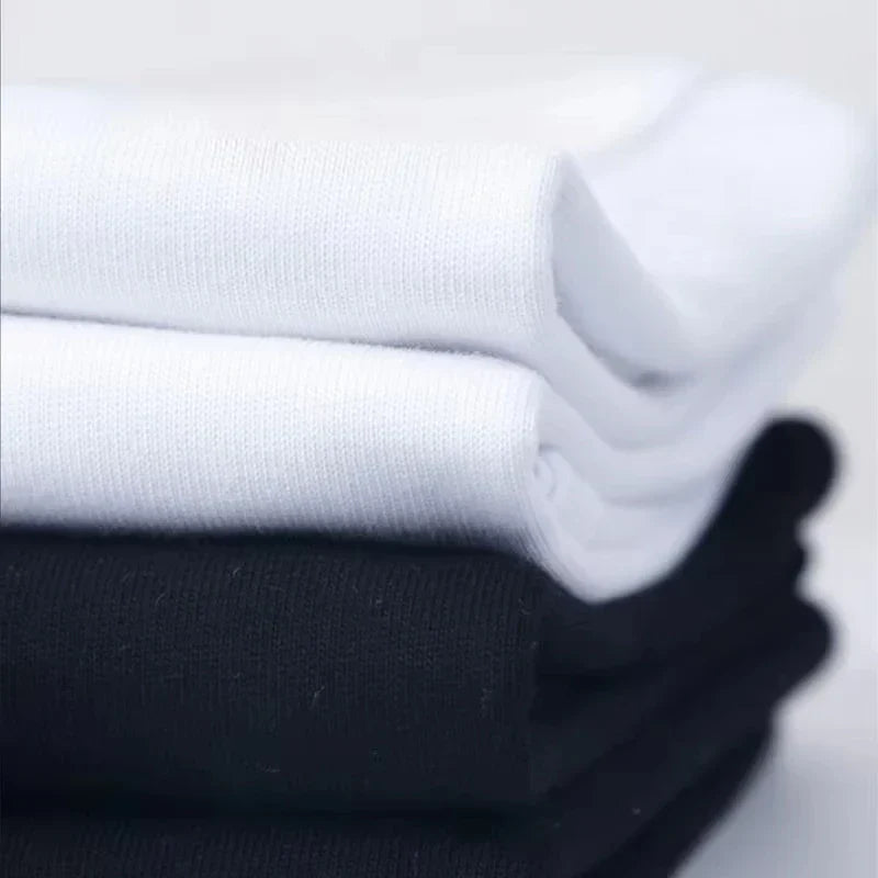 Stacked white and black crew socks with soft ribbed texture paired with rapper frank retro y2k unisex blond t shirt