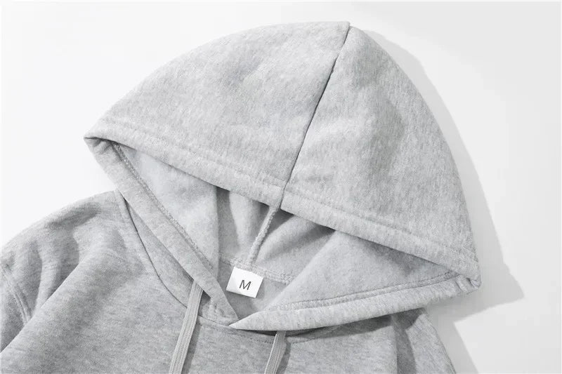 Gray heathered rapper grecas tour album print hoodie with soft textured fabric and matching drawstrings for loose casual harajuku style