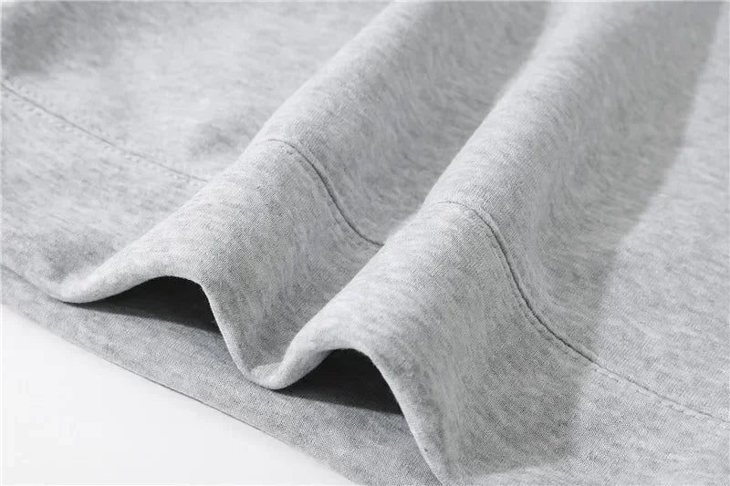 A soft heather gray cotton rapper grecas tour album print hoodie with ribbed hem loose casual harajuku sweatshirt