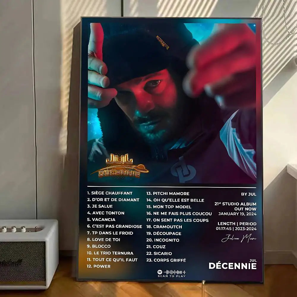A framed poster of rapper jull with red and blue lighting featuring décennie album tracklist for home wall decor sticker