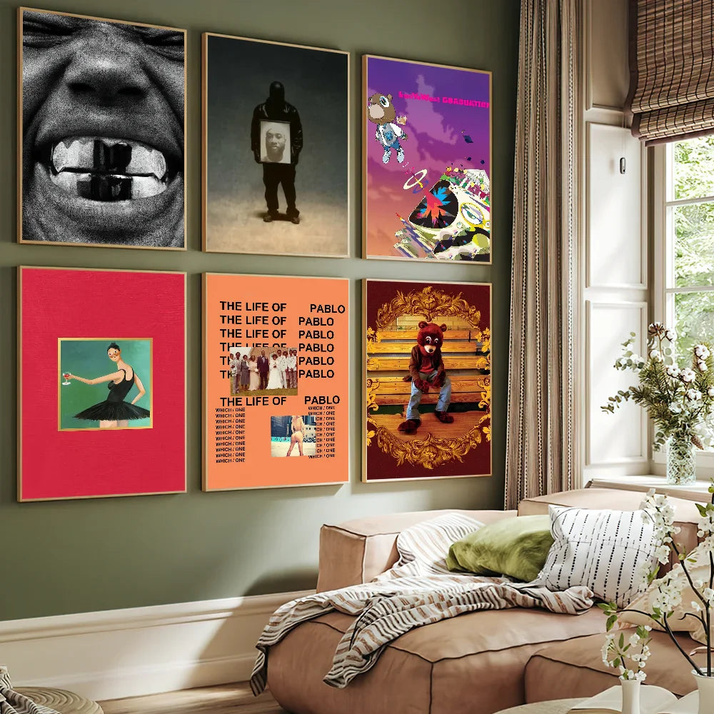A collection of six framed rapper k kanye w west bully album poster prints featuring black and white and colorful designs
