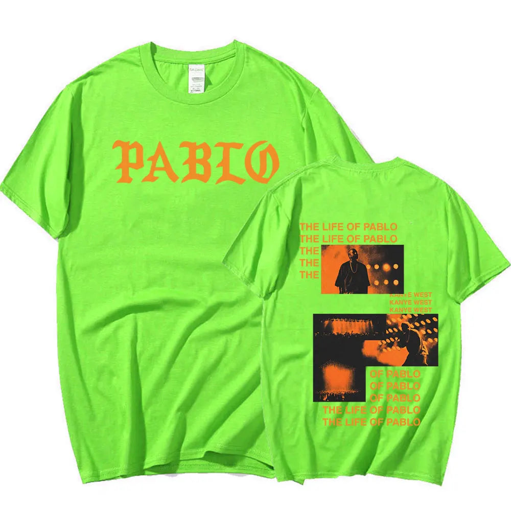 Vibrant neon green pablo t shirt with bold orange rapper kanye west lettering and hip hop fashion concert print on back