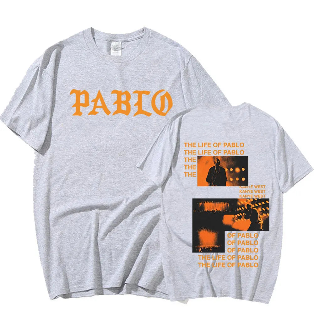 Gray cotton pablo t shirt featuring orange lettering front and rapper kanye west graphic print on back for hip hop fashion