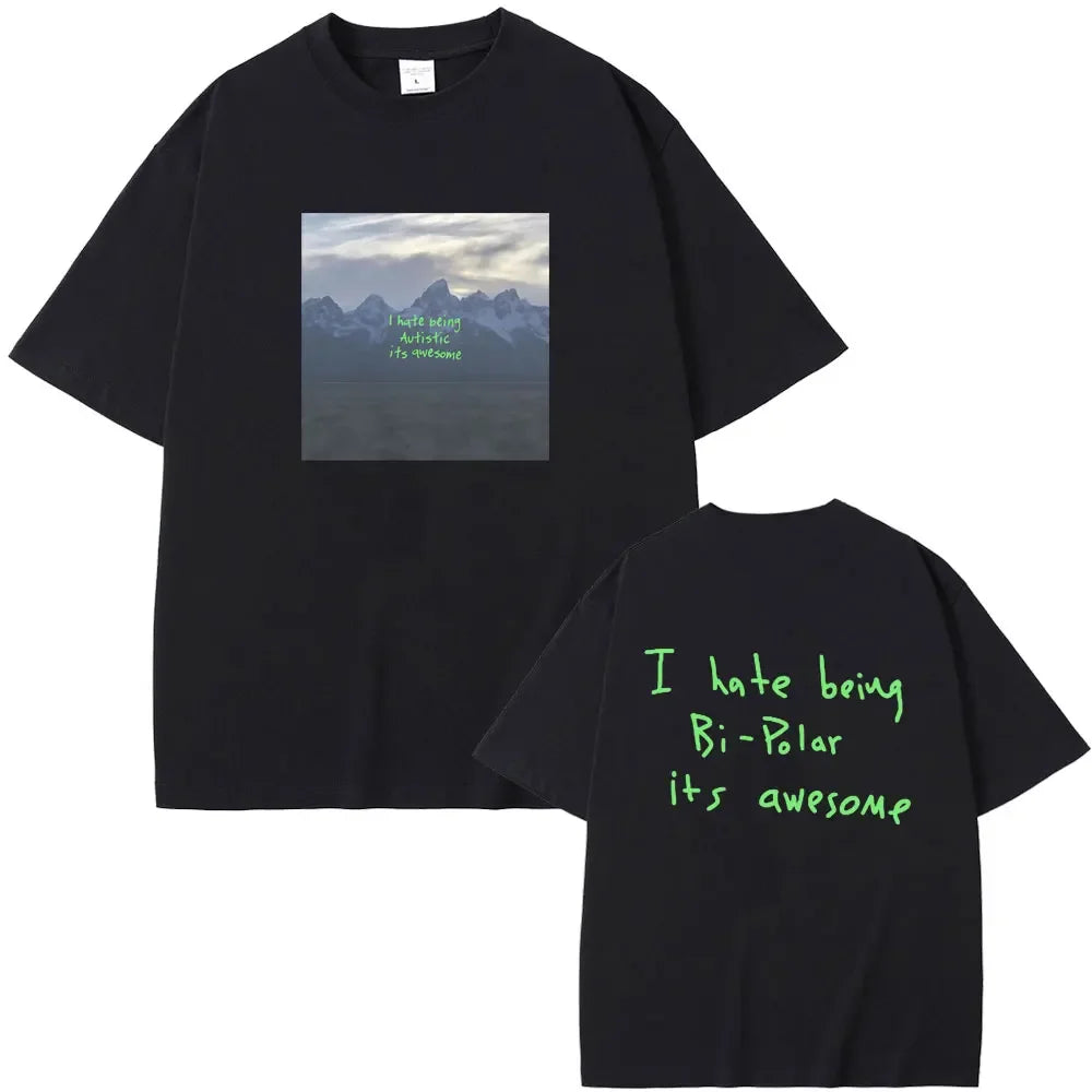 Black oversized cotton t-shirt with kanye west vultures graphic front and neon green hip hop fashion lettering back