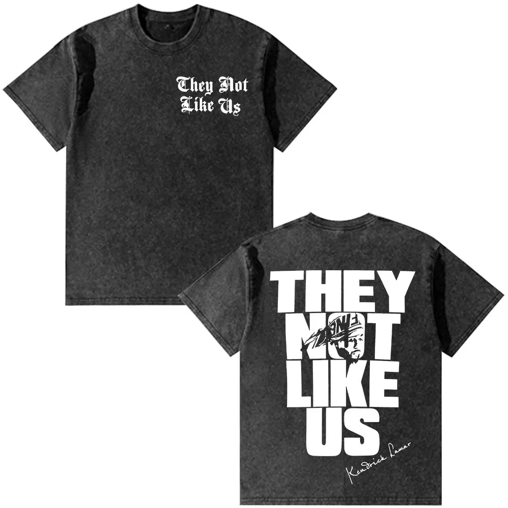 Black distressed cotton t-shirt featuring bold white graphic and stylized portrait on back with they not like us text vintage washed oversized fashion hip hop rapper kendrick lamar