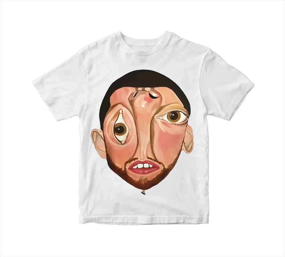 White t-shirt featuring a stylized surreal face with exaggerated eyes and lips inspired by rapper mac miller album balloonerism poster hip hop y2k fashion