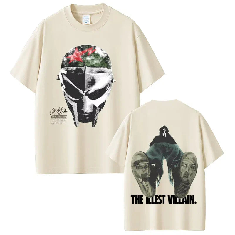 Cream-colored short sleeve cotton t-shirt featuring rapper mf doom helmet graphic front and jeans figure print on back in hip hop fashion