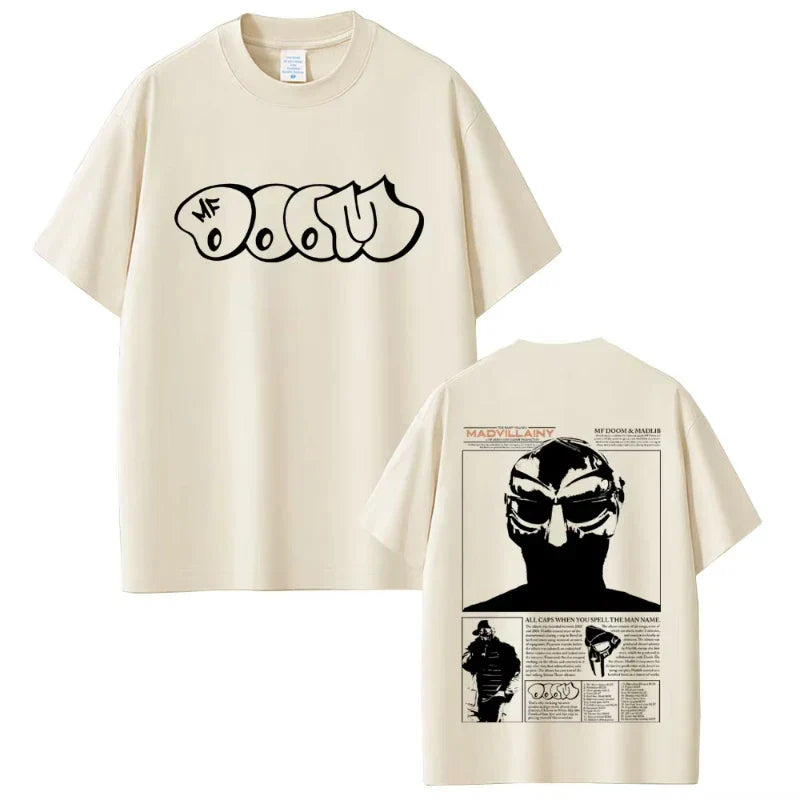 Cream-colored cotton t-shirt with bold black mf doom graphic on front and detailed doom album madvillainy illustration on back in hip hop fashion style