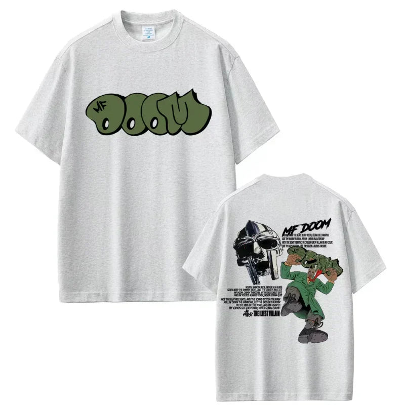 White cotton oversized t-shirt featuring green graffiti-style rapper mf doom logo and doom album madvillainy graphic for hip hop fashion