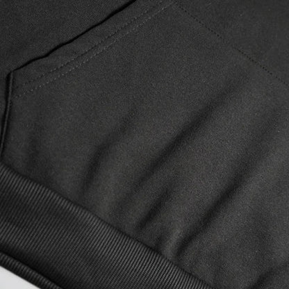 Black fabric pocket with ribbed trim on rapper mgk lost vintage hip hop sleeve oversized y2k hoodie
