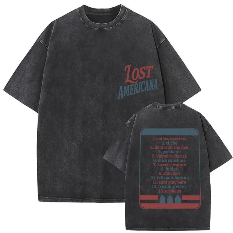 Black distressed cotton t-shirt with lost americana lettering and printed tracklist on back from mgk lost americana tour 2026