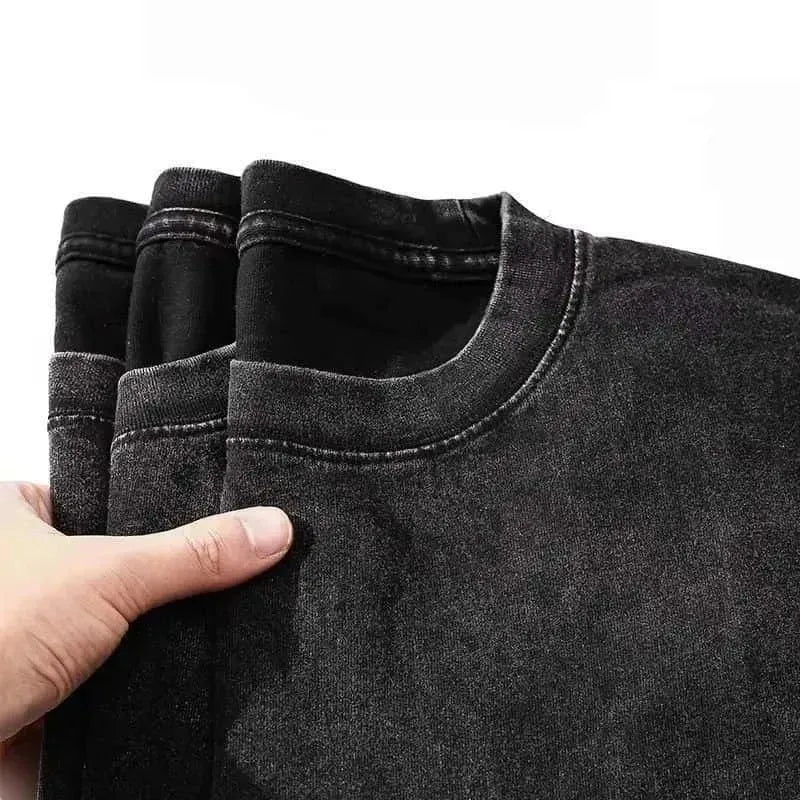 Black distressed denim t-shirt with soft faded texture and crew neck from mgk lost americana tour vintage collection