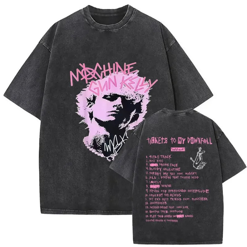 Black oversized t-shirt featuring pink mgk lost americana graphic with machine gun kelly signature and tracklist design