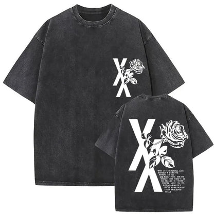 Black oversized t-shirt with white stylized xx and rose graphic on front and text on back from mgk lost americana tour