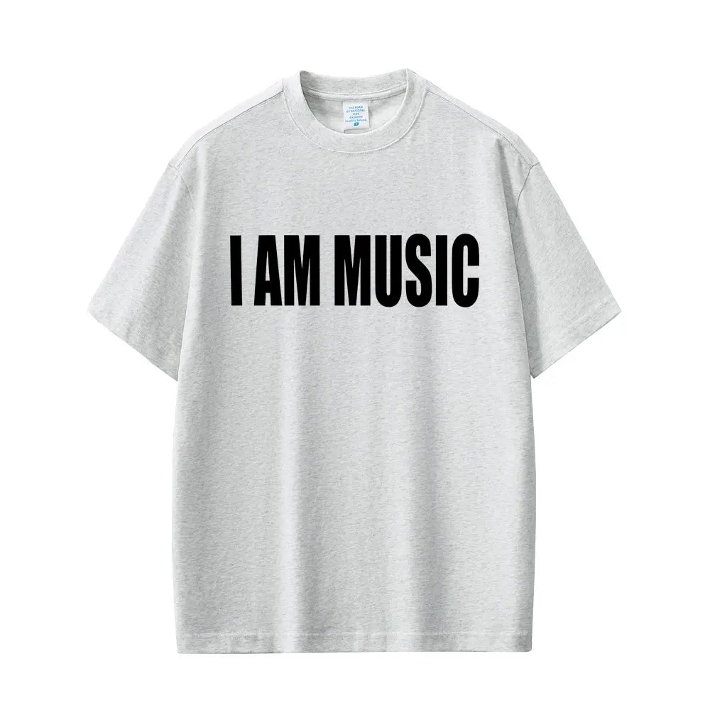 A light gray short-sleeved rapper playboi carti men fashion rap oversized t-shirt with bold black I am music text
