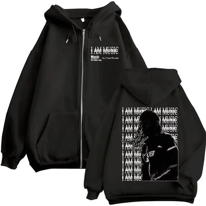 Black zip-up hoodie with white i am music text and graphic print on back featuring rapper playboi carti opium ken carson hip hop pullovers