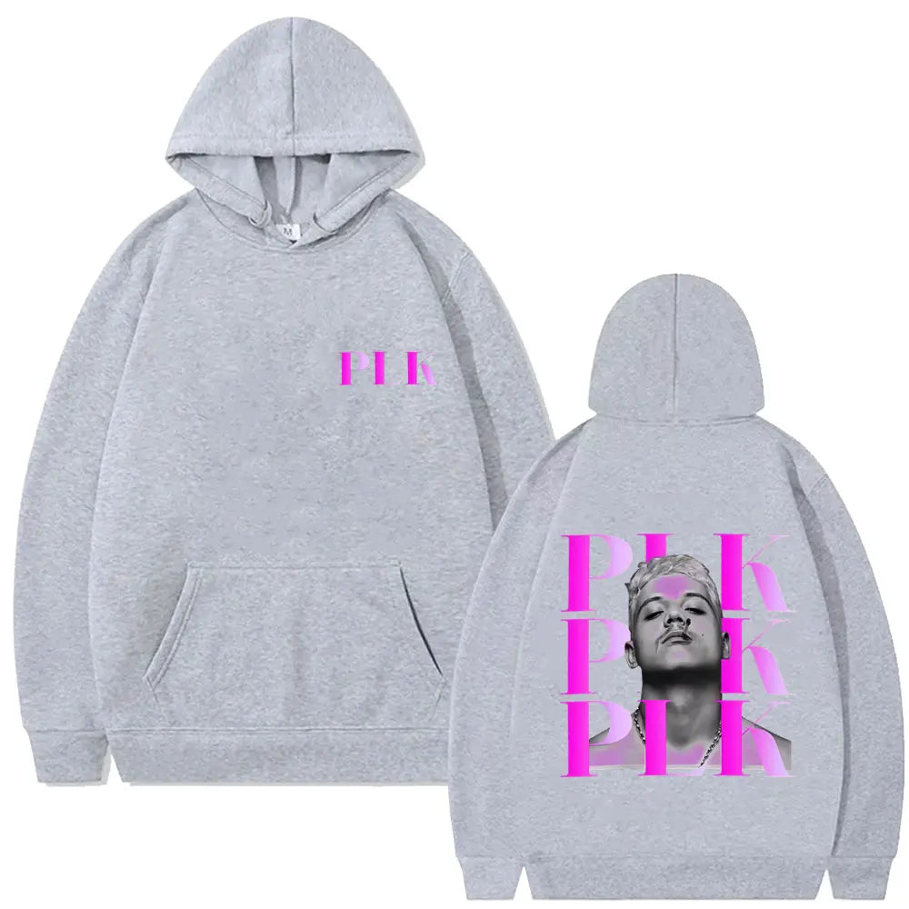 Gray hoodie featuring a bold pink rapper plk face graphic on the back and matching fashion pop music text on the chest