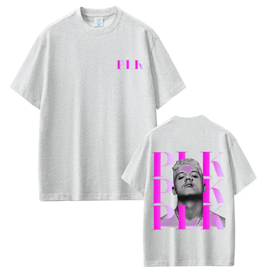 White oversized fashion pop t-shirt with bold pink rapper plk face graphic print on back vintage hip hop style