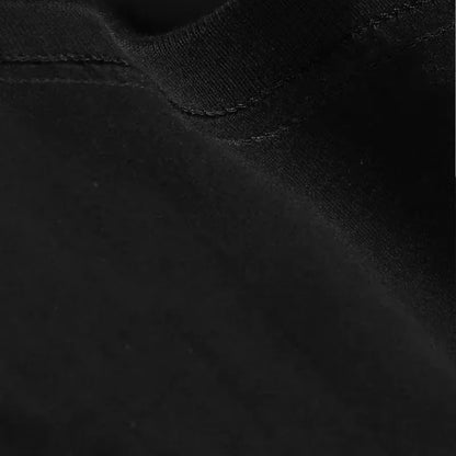 Black leather collar with subtle stitching detail paired with rapper plk polak graphic vintage t shirts for women hip hop style