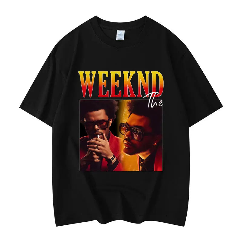 Black cotton oversized t-shirt featuring vibrant rapper the weeknd graphic with bold gradient lettering in clothing hip hop style