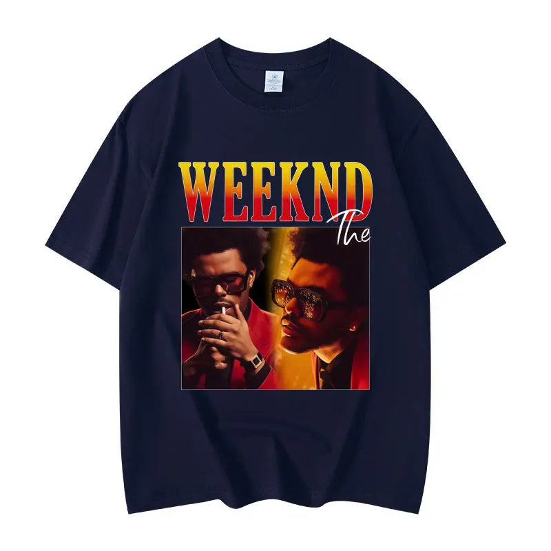 Navy blue short-sleeved graphic t shirt featuring The Weeknd print with bold gradient text made of high quality cotton for hip hop fashion