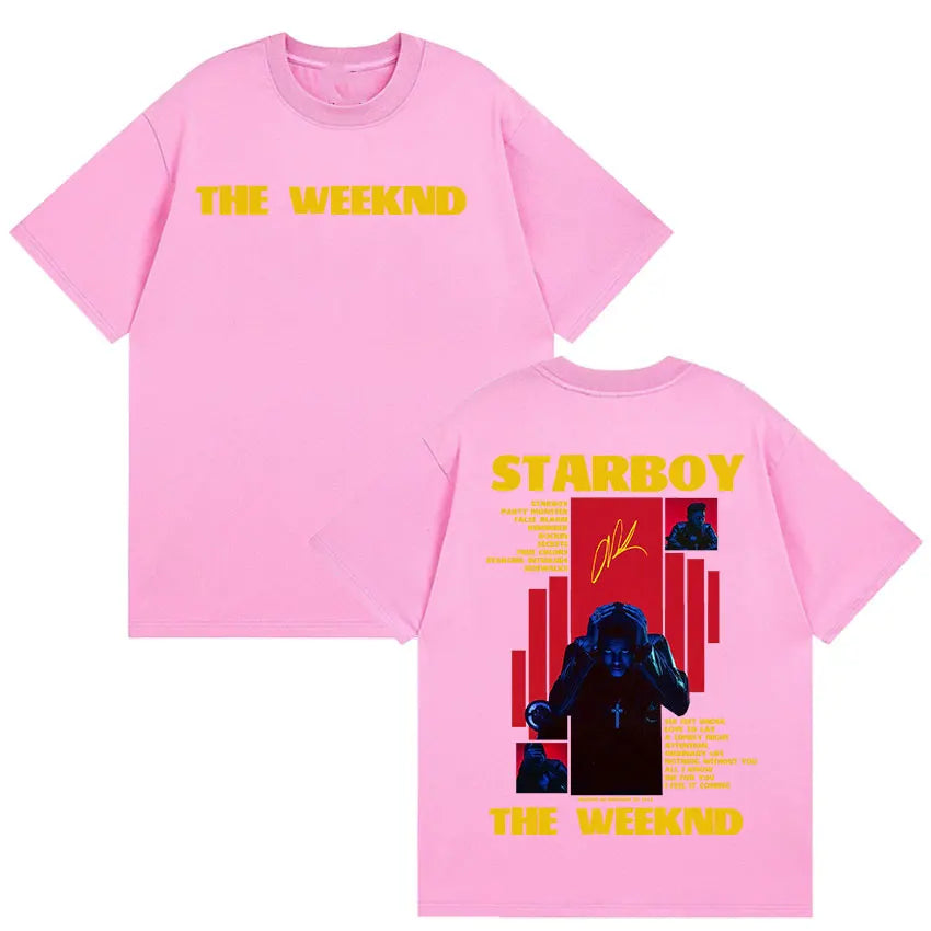Pink cotton short sleeve t-shirt showing the back with bold yellow weeknd starboy album lettering and gothic hip hop design