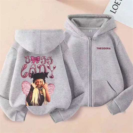 Gray zip-up hoodie featuring lady gaga graphic with pink wings bass lany text and theodora logo embroidered on chest