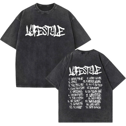 Black oversized rapper yeat lyfestyle vintage washed t shirt with distressed fabric and hip hop fashion graffiti lettering front and back