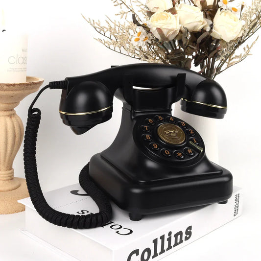 Black vintage-style rotary recording message phone with gold accents for audio guestbook recording at wedding events