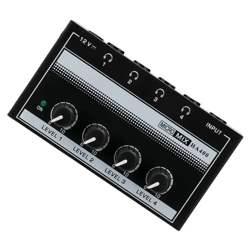 Black metal recording studio headphone amplifier with four rotary level knobs and headphone input jacks for office splitter use