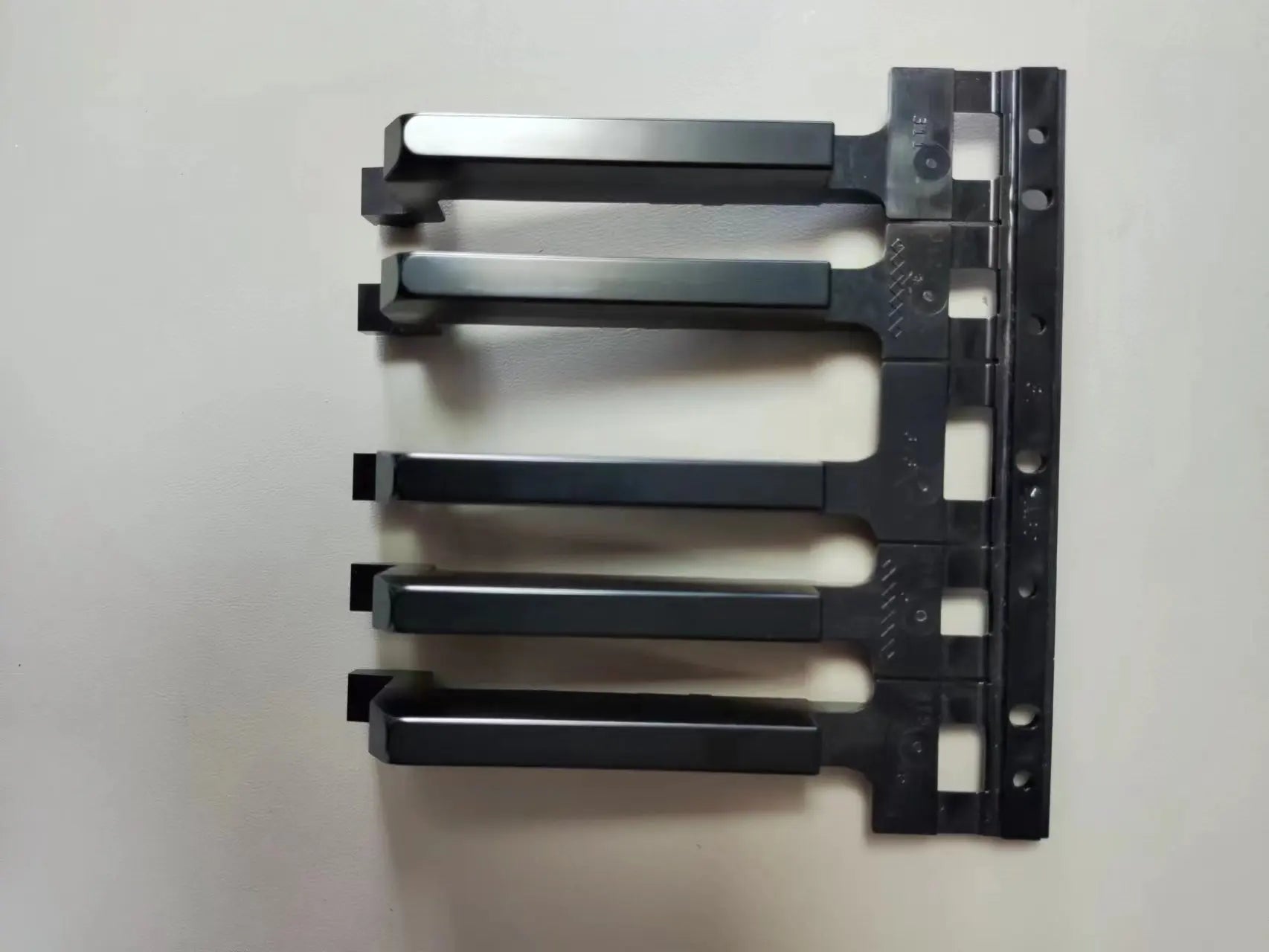Black plastic cable management clips with matte finish and rectangular slots for yamaha p45 p48 replacement digital piano repair parts