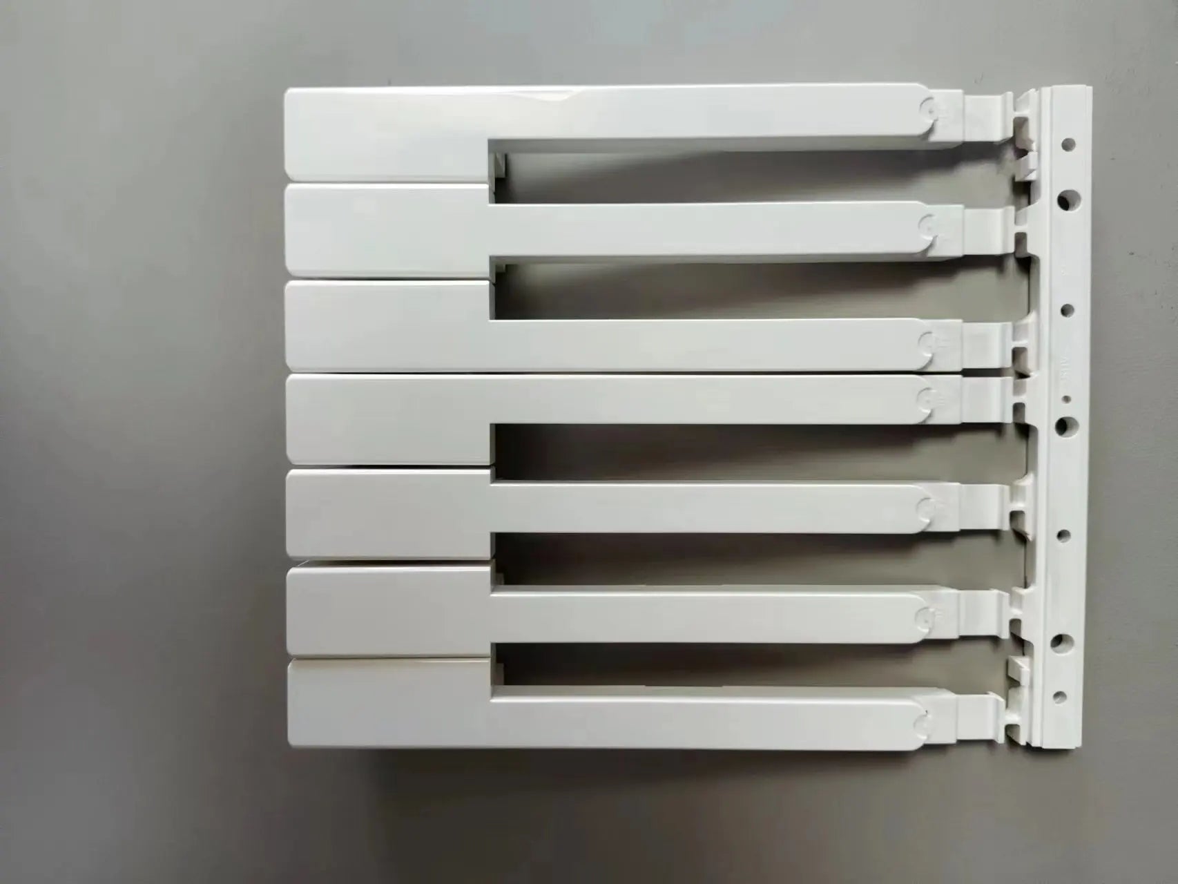 White sleek metal radiator with horizontal fins for replacement digital piano repair yamaha p45 p48 keys