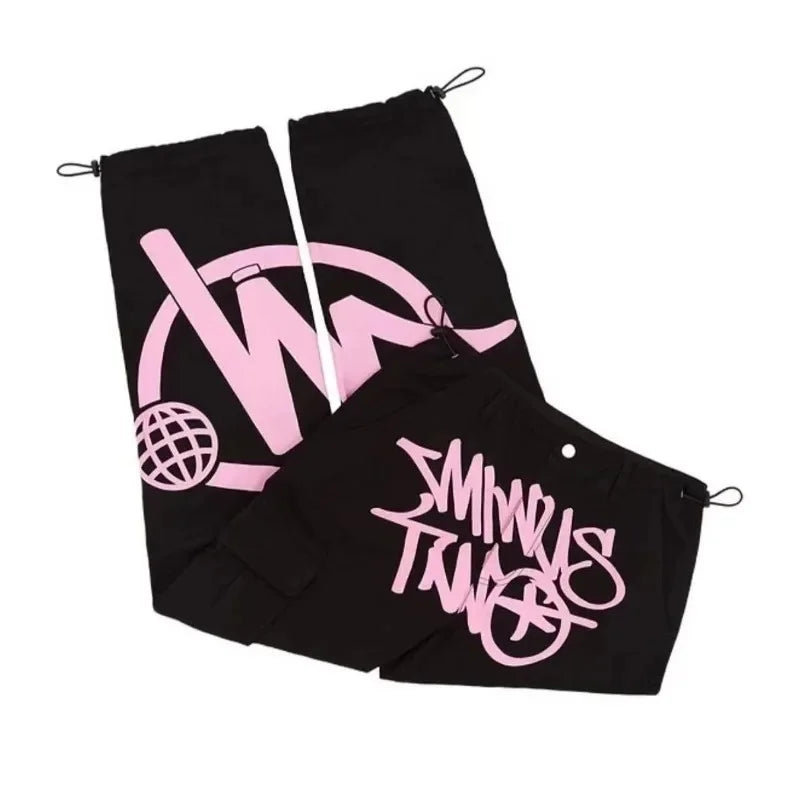 Black drawstring storage bags with pink graffiti-style logos and globe graphic for men dance scene pocket print casual use