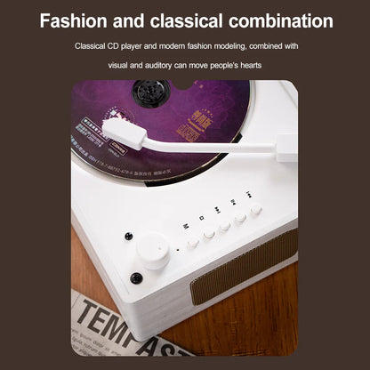 White rectangular desktop cd player with gold speaker grille and purple disc for home music player use