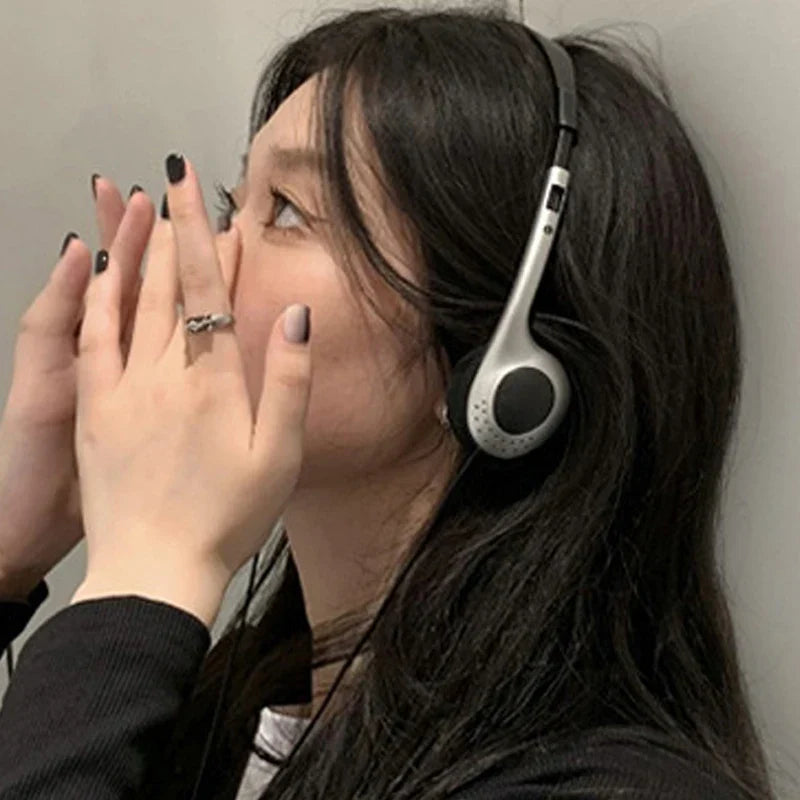 Silver and black over-ear retro classic headset with sleek design for music mp3 walkman and small headphones sports use