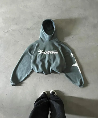 A gray cropped hoodie with white star and totten branding in retro gothic men style for street trendy2k harajuku look