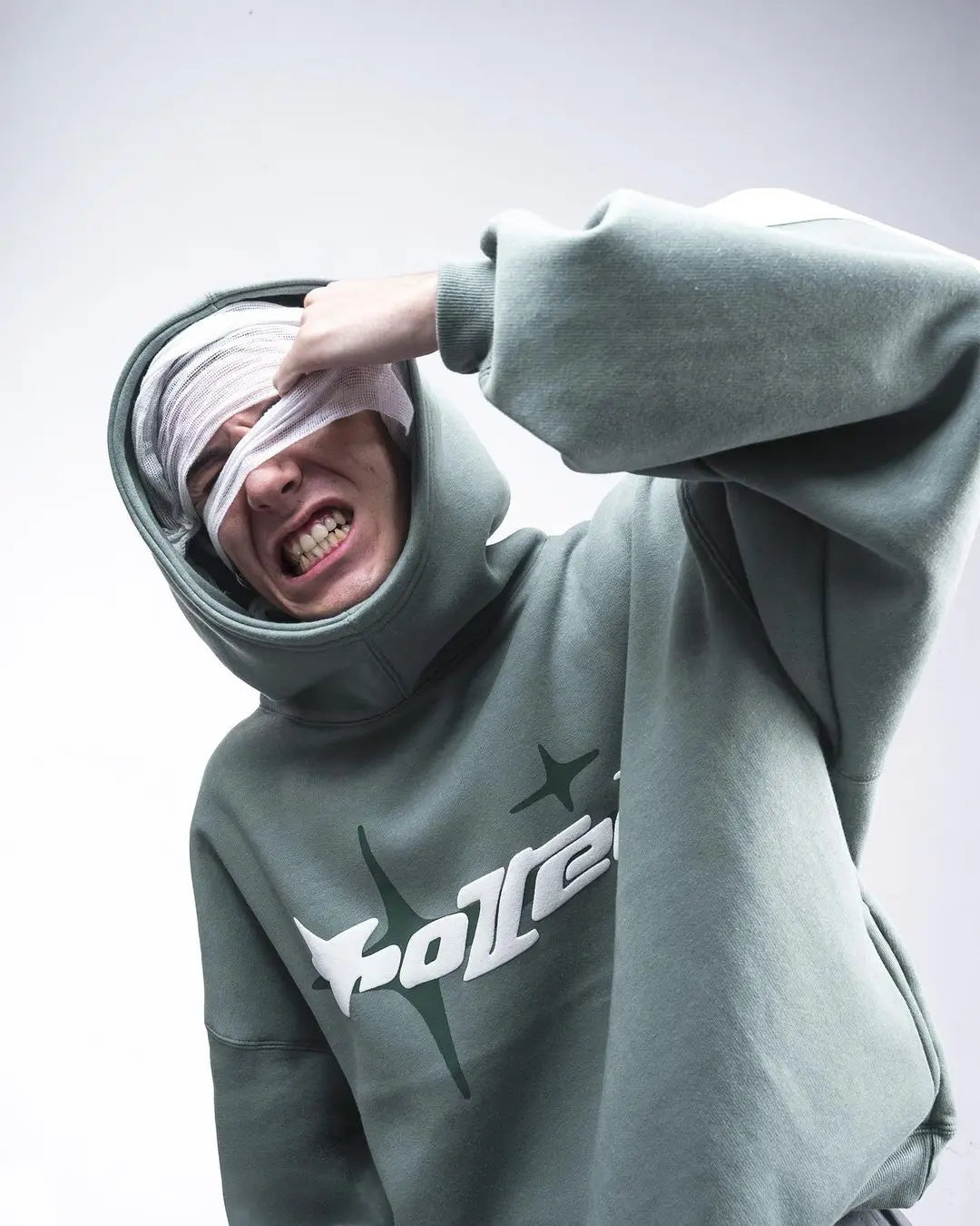 Gray hoodie with white and black star logo across the chest retro gothic men street trendy2k harajuku loose sweatshirt
