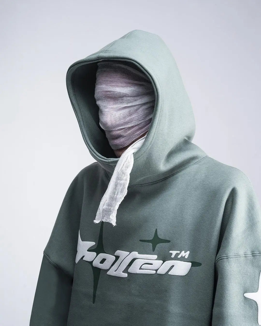 A muted green retro gothic men hoodie with a white and black rolten logo street trendy2k harajuku men loose style